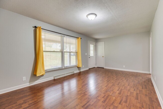 Building Photo - Spacious 3-Bedroom Home with Finished Base...