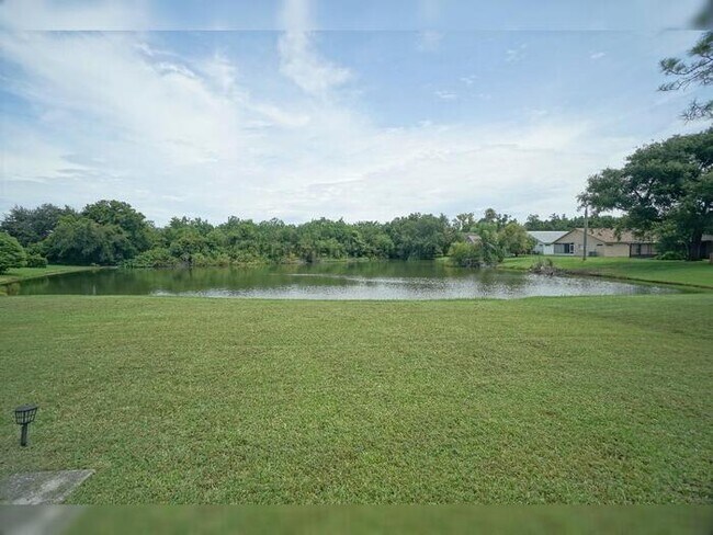 Building Photo - Charming 3 Bed, 2 Bath Home with Pond View in Sought-After Community