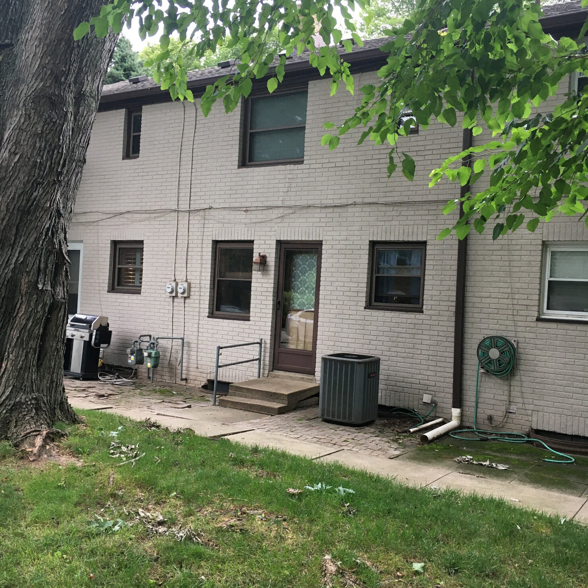 Rear common area AC condenser - 189 Newman St