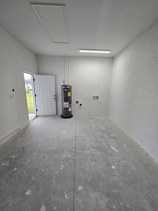 Building Photo - BRAND NEW 3/2/1 -SW LEHIGH ACRES FL