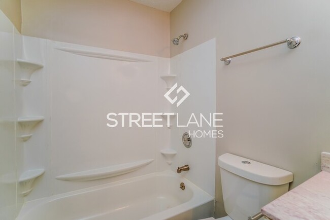 Building Photo - REDUCED- Now offering $1000 off first full...