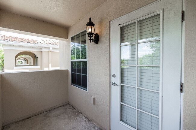 Building Photo - Beautiful 3/3 w/ 2 Car Garage in Gated Vil...