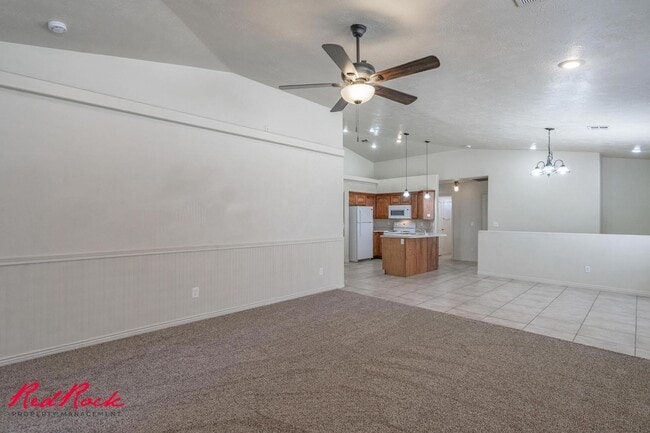 Building Photo - Fresh Carpet! Spacious 5-Bedroom Townhome