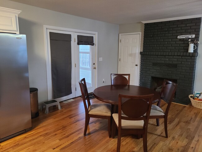 Dining area near fireplace and sunroom - 2228 Alabama Ave