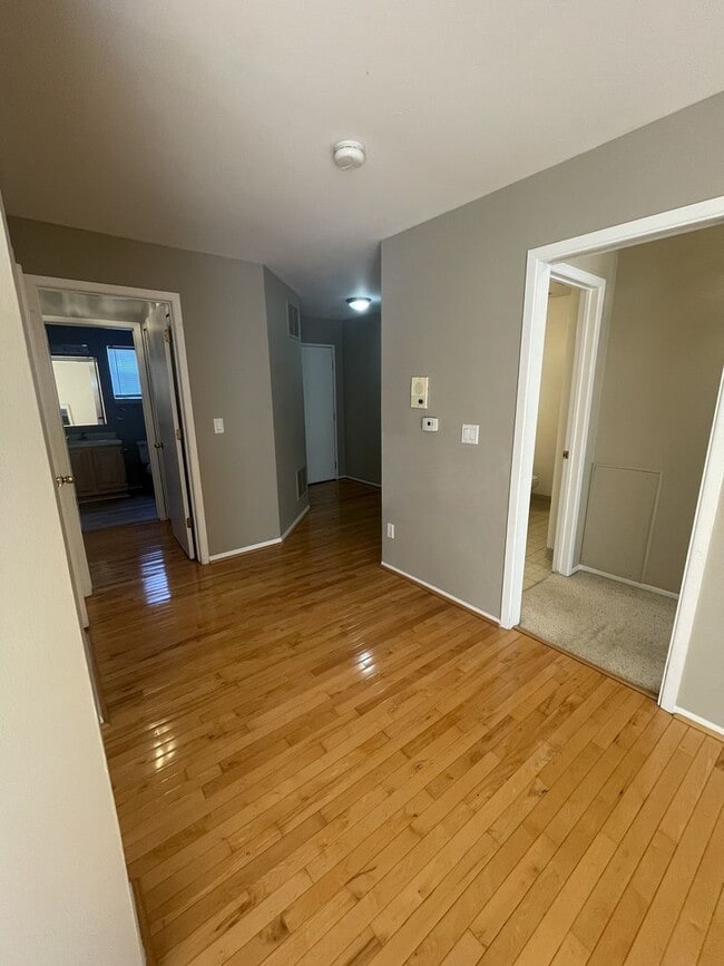 Building Photo - Three Bedroom Two Bath Condo | Laundry, Parking, & Central AC