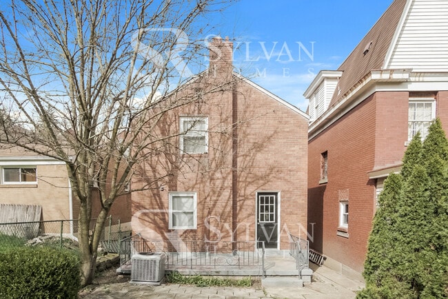 Building Photo - Charming brick 3-bedroom, 1-bath home features a deck and patio!