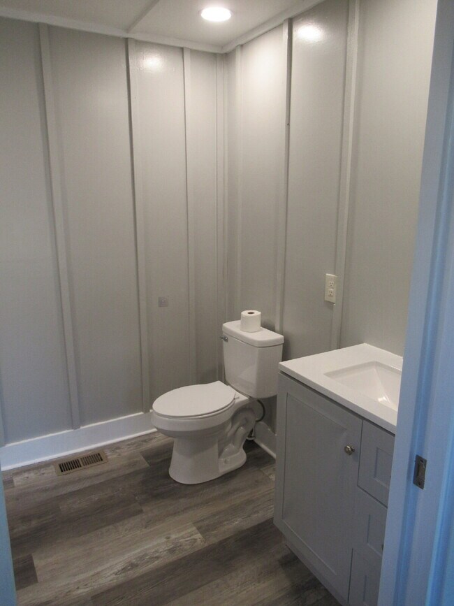 Building Photo - Check out this beautifully renovated white...