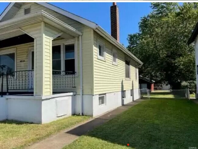 Side yard and porch - 8820 N Broadway