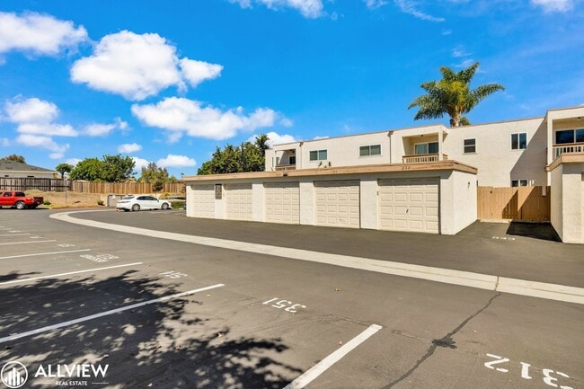 Building Photo - Modern 1-Bed Upstairs Condo with Garage & ...