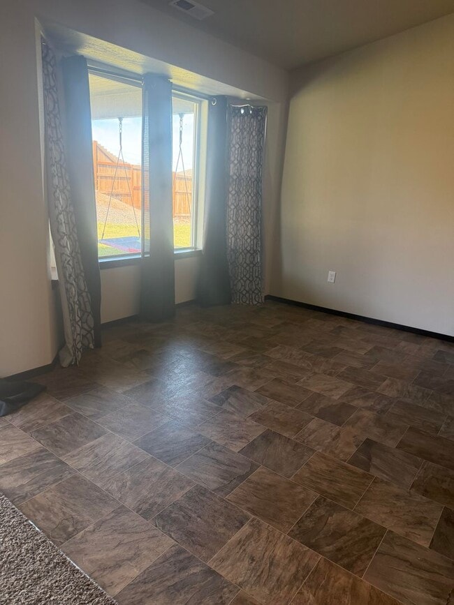 Building Photo - Lots of storage space in this 4- Car garage for all your playthings!!