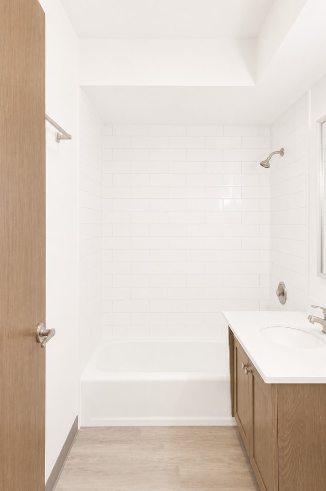 Building Photo - Spacious Rehabbed 1-Bedroom at The Vine | Private Balcony + Parking