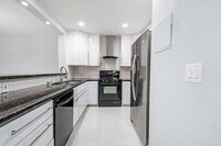 Building Photo - 6063 10th Ave N