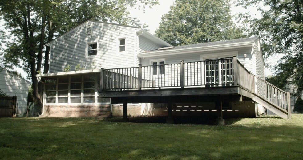 Backyard With Deck & Sunroom - 1769 Dakota St