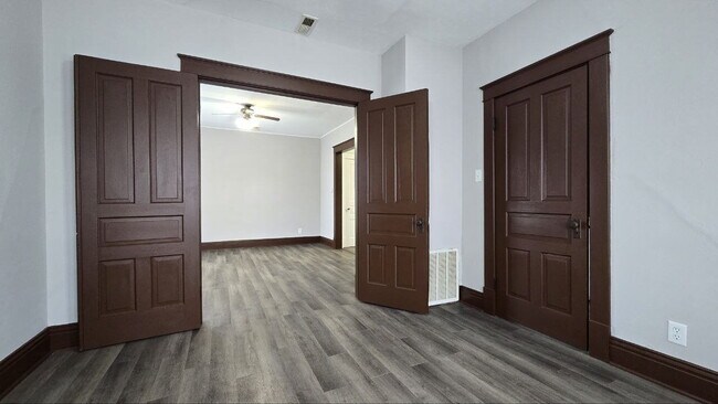 Building Photo - Spacious 3BR/1BA First-Floor Home with Garage & Fenced Yard in Quiet Michigan City Neighborhood