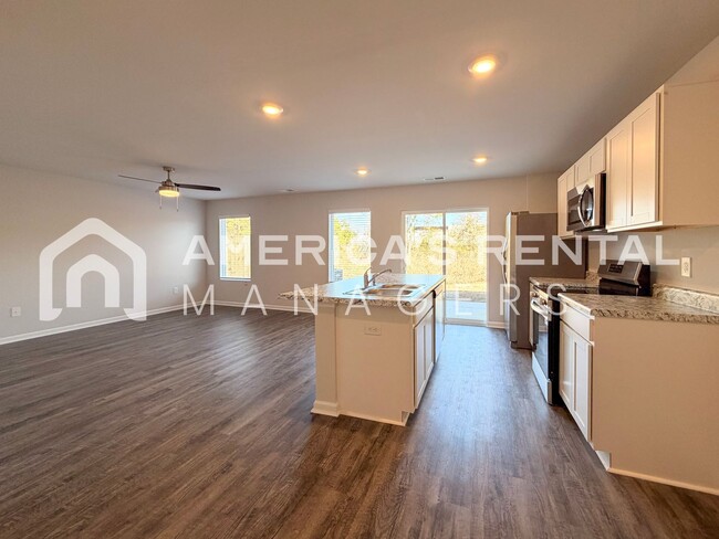 Building Photo - Spacious Two-Story Townhome with Open Layout!