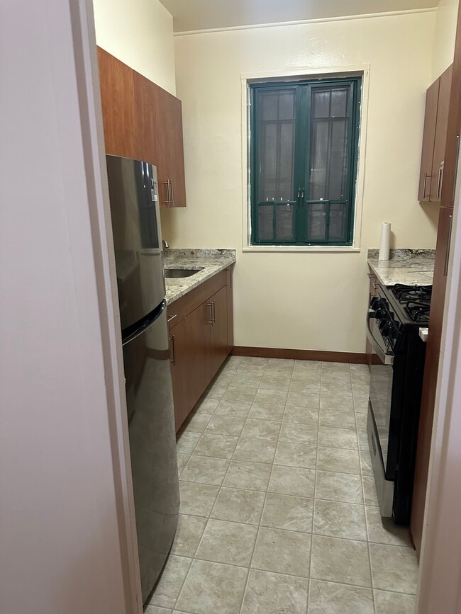 Freshly Renovated Kitchen Plenty of Cabinets - 1680 Metropolitan Ave