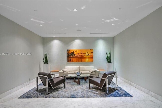 Building Photo - 10155 Collins Ave
