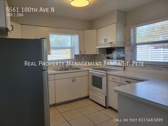 Building Photo - 5561 100th Ave