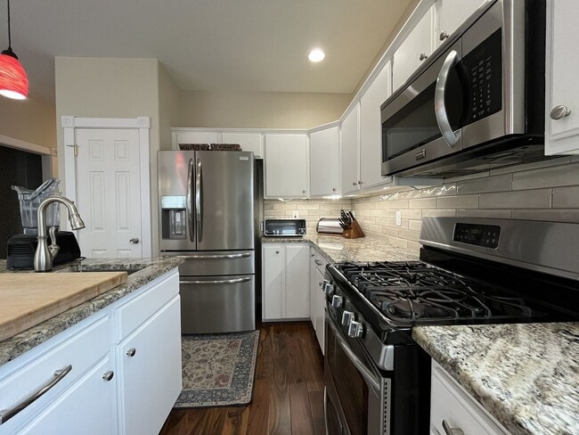 Building Photo - Elegant 5BR + Bonus Room Home with Bay Windows, Entertainment Room & Oversized Primary Retreat