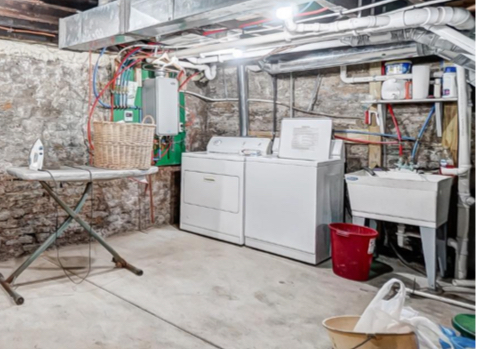 Laundry area - 2813 Colerain Ave