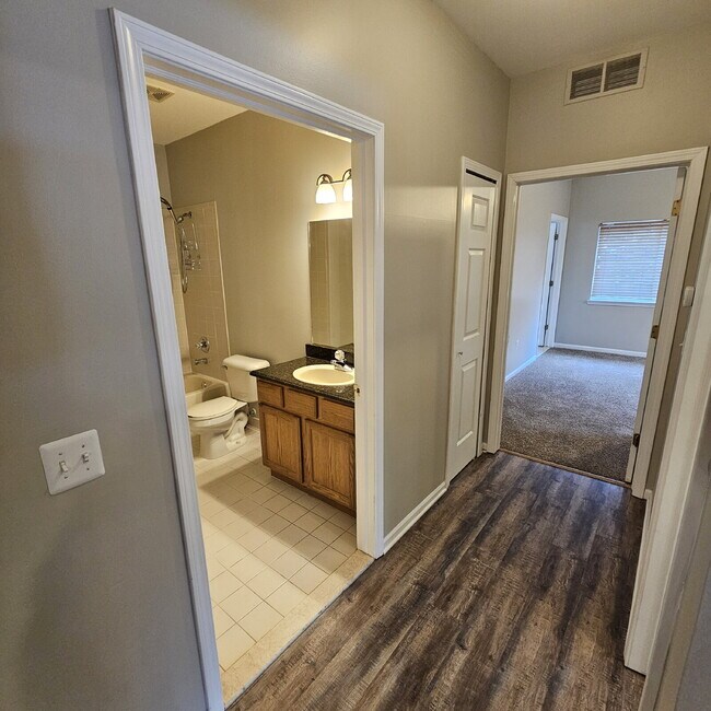 Building Photo - Spacious 2-Bedroom Townhouse with 2 Full Baths, Fireplace & Garage