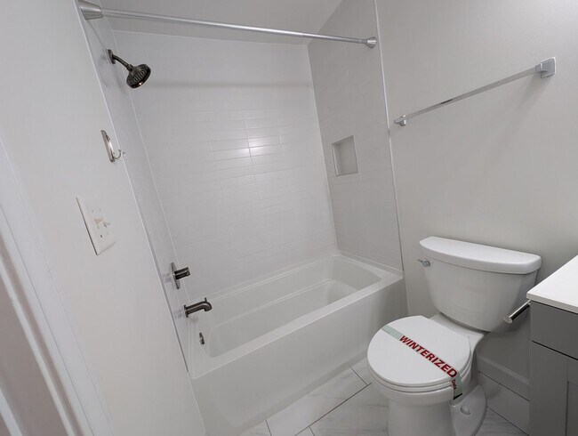 Building Photo - Pristine End Unit Townhome located in the Prosperity Place community!