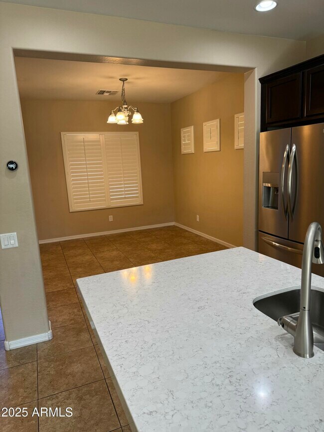 Building Photo - 11009 E Sutter Ave