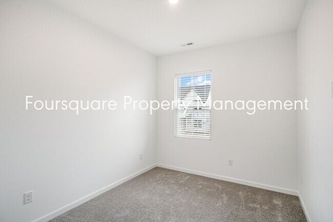 Building Photo - Spacious 3-Bed / 2.5-Bath Townhome with First-Floor Den, Hardwood Floors & 1-Car Garage – Wendell...