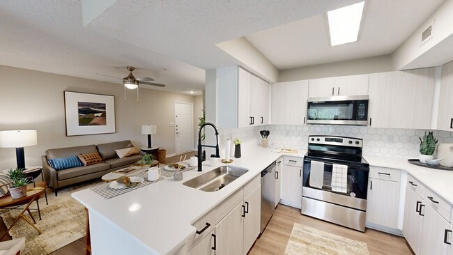 Newly Renovated Kitchen with Gorgeous Hardwood-Style Flooring - 1250 West Apartments