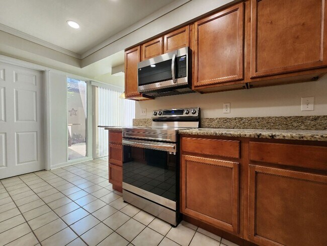 Building Photo - Gorgeous 3-Bedroom, 2.5-Bathroom Townhome ...