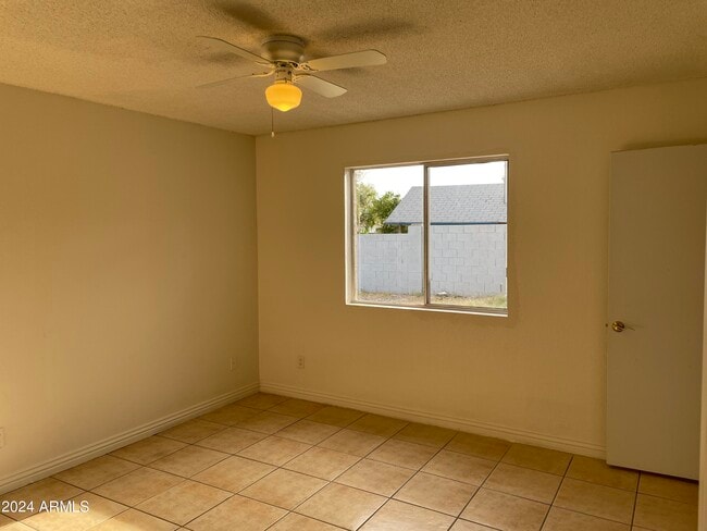Building Photo - 8333 W Roma Ave