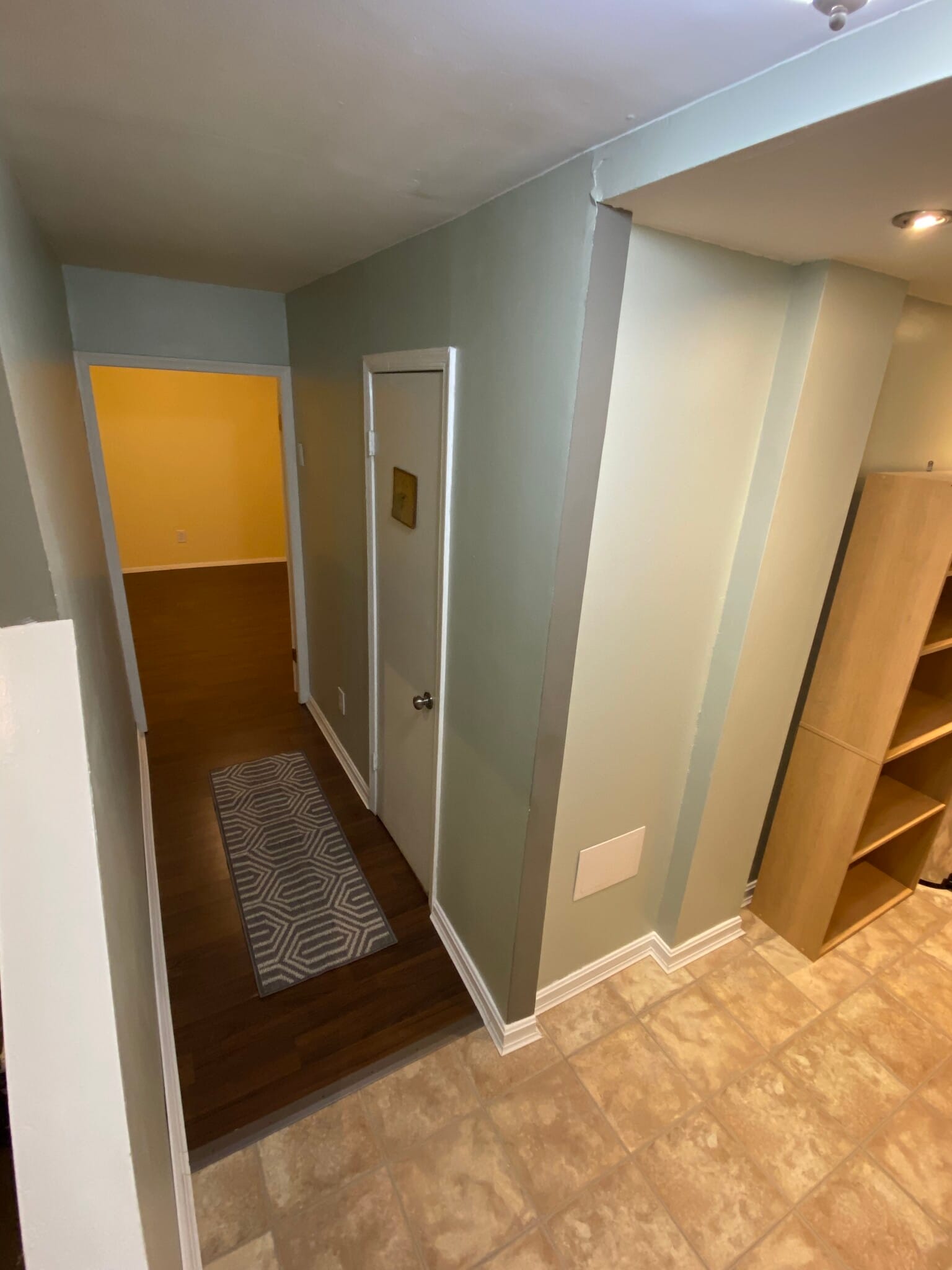Room and private bathroom to the left and kitchenette to the right. - 8371 Stationhouse Ct