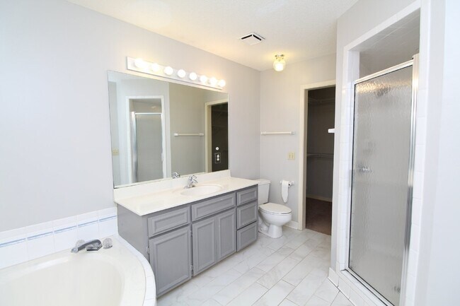 Building Photo - Pool Home with Office, Two Primary Suites ...