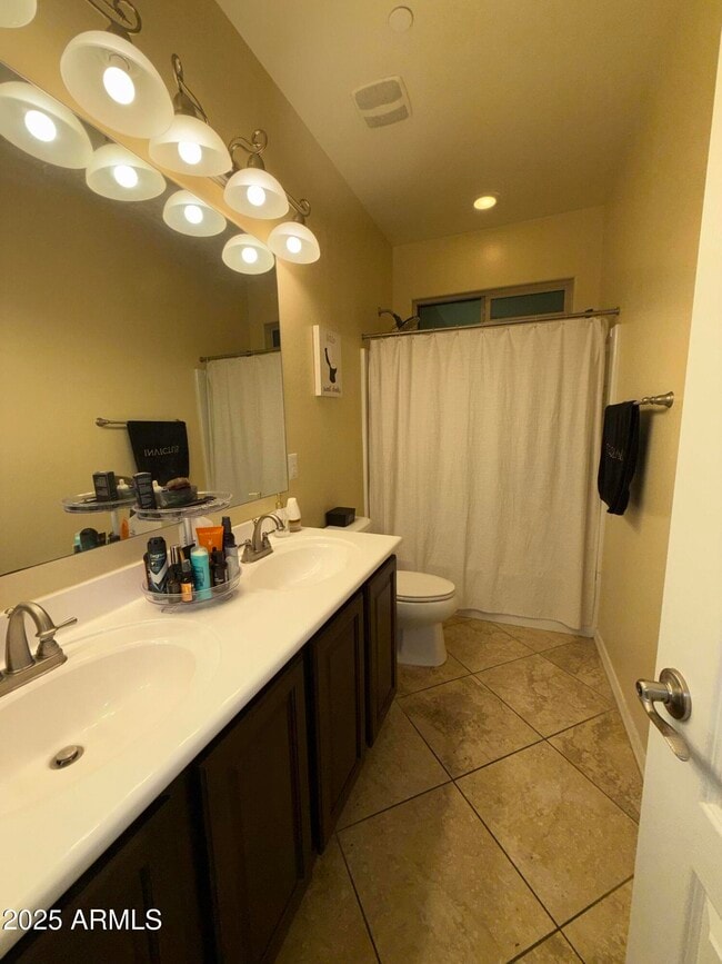 Building Photo - 9242 W Meadow Dr