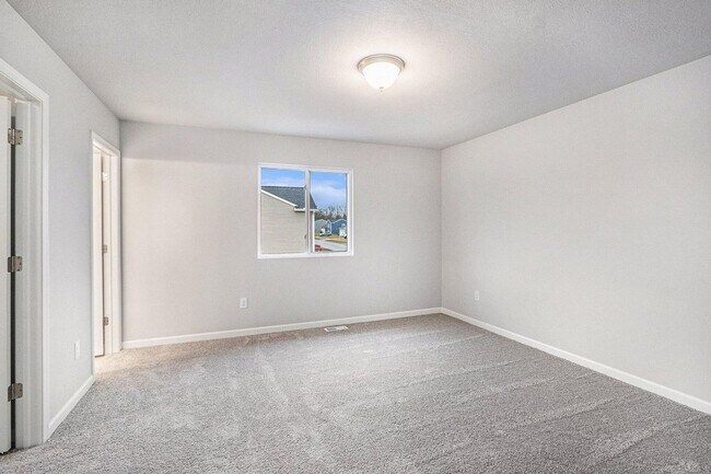 Building Photo - Newly Constructed Four Bedroom Home in Por...