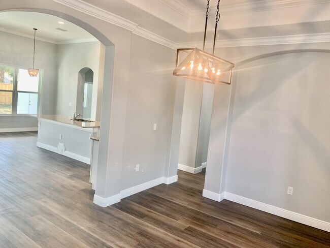 Building Photo - "Spacious 4-Bedroom 3-Bath with In-Law Suite & Granite Finishes in Palm Bay!"