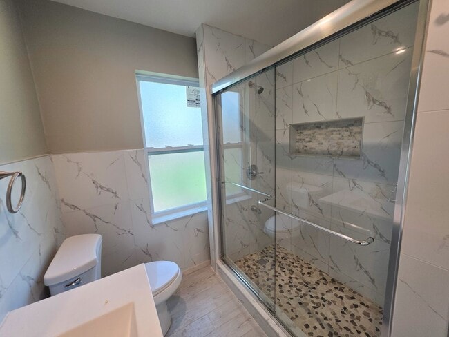 Building Photo - 100% Remodeled 2 bedroom 1.5 bath ANNUAL RENTAL