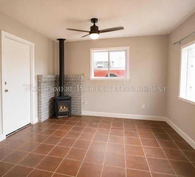 Building Photo - Three Bed Rambler on large fenced corner lot with patio