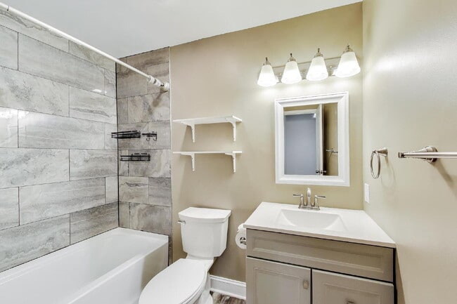 Building Photo - Spacious Updated Condo Available for Immediate Move-In