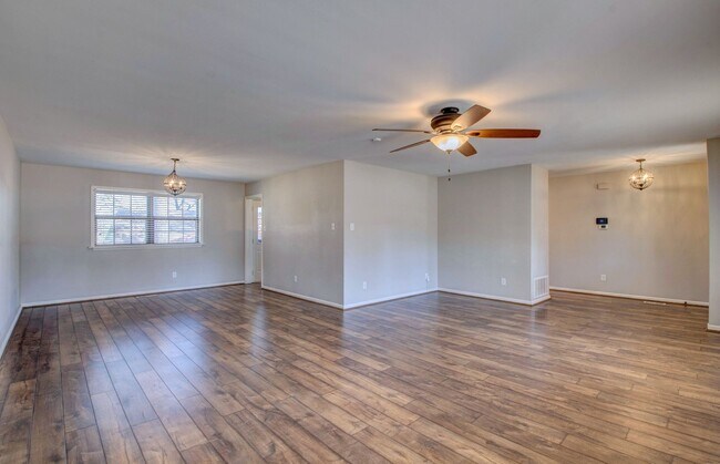 Building Photo - Welcome Home: Charming Brick Beauty with Covered Porch.