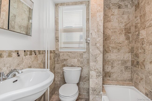 Building Photo - 5630 Riverdale Ave