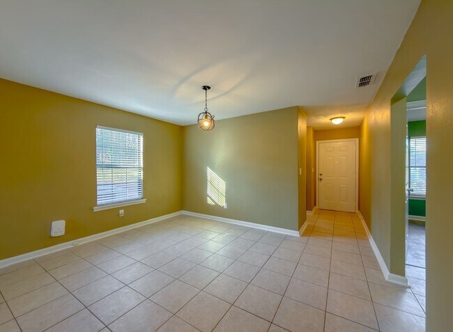 Building Photo - LOVELY & Modern NW 2/1 w/ New Flooring & Huge Privacy Fenced Yard that Inc Lawn Maintenance! Avai...