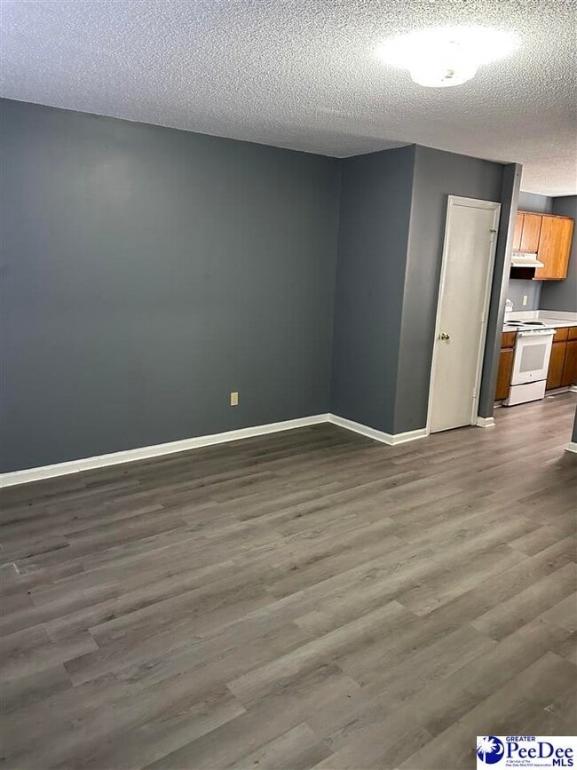 Building Photo - 1017 E National Cemetery Rd