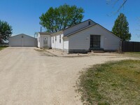 Building Photo - Amazing Farmhouse with multiple out buildi...