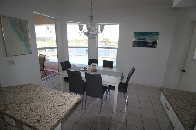 Building Photo - Short Term Rental ** Available 11/1/25 ** 3 Bed/2 Bath Pool Home ** Punta Gorda Isles** $7,500/mo