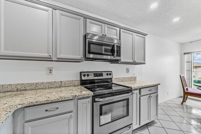 Building Photo - 5710 Princess Palm Ct