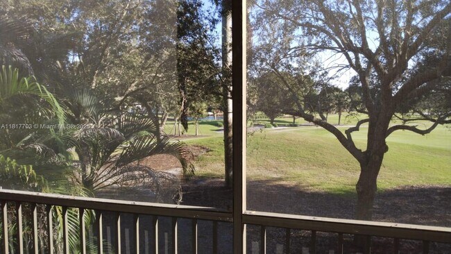 Building Photo - 200 Jacaranda Country Club Dr