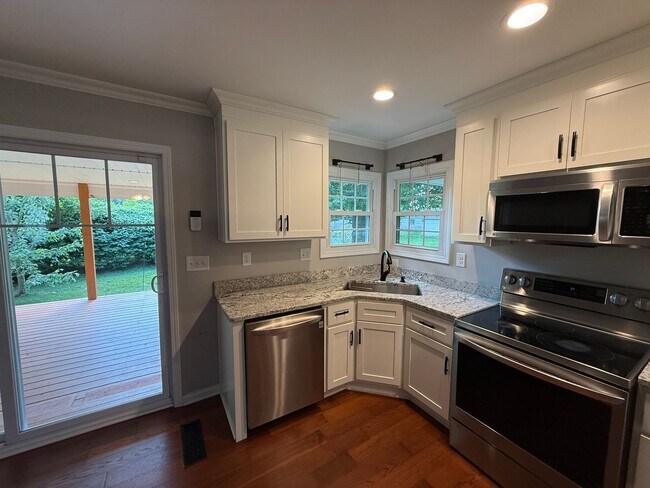 Building Photo - REMODELED 4-BEDROOM HOME W/FENCED YARD
