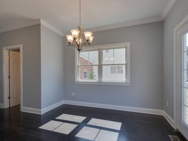 Building Photo - Spacious Luxury Townhome! Outstanding Location!