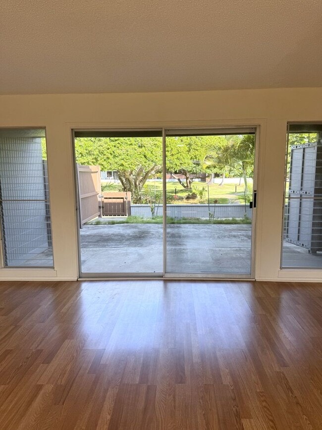 Building Photo - Koko Isle Circle - 3 bedroom, 2 full bath, 1 half bath with two car carport